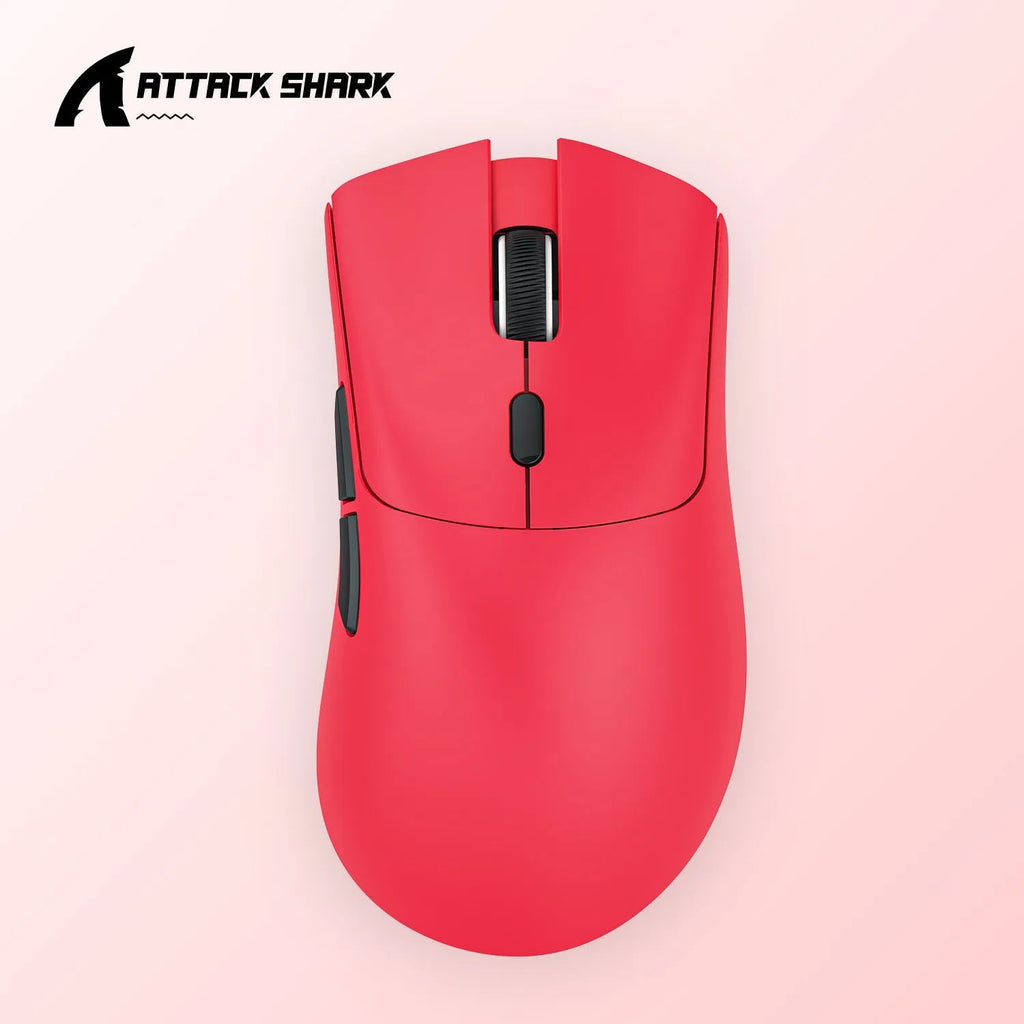 Attack Shark wireless Bluetooth mouse in black, red, or white on a desk next to a laptop.