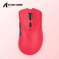 Attack Shark wireless Bluetooth mouse in black, red, or white on a desk next to a laptop.