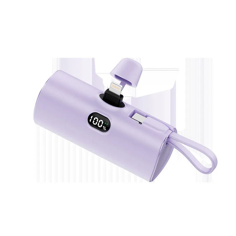 Wireless power bank with digital display showing battery percentage, pocket-sized portable charger