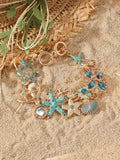 Alloy marine bracelet with boat anchor, star, and starfish rhinestone elements in turquoise, coral red, or coral blue