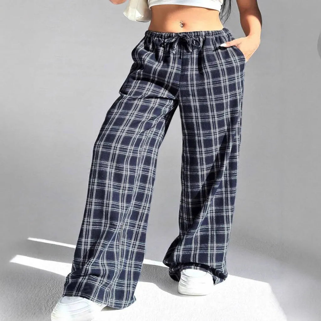 Women's loose fit plaid trousers with drawstring waist and side pockets in red colour