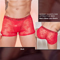 Men's black boxer briefs with white lace trim detail on a grey background.