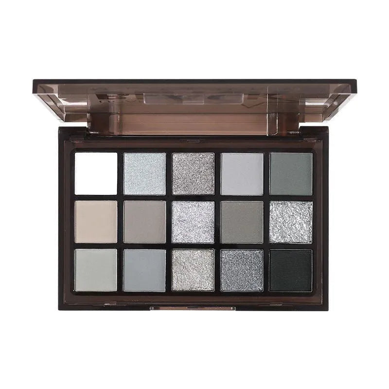 15-colour eyeshadow palette open showing matte and shimmer brown and blue eyeshadows.