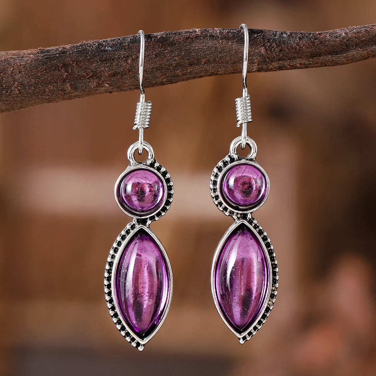 Black and purple geometric pendant earrings with round shapes and electroplated zinc alloy construction