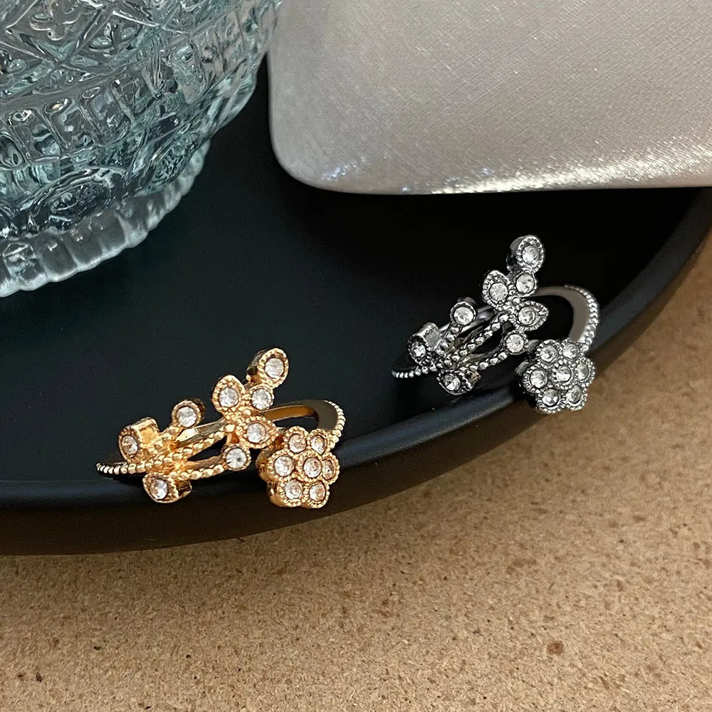 Women's open ring with diamond flower leaves design in copper, gold or white colour options