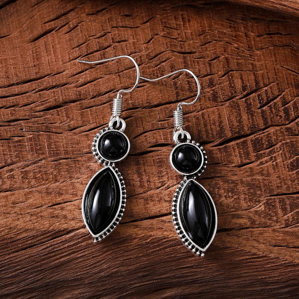 Black and purple geometric pendant earrings with round shapes and electroplated zinc alloy construction