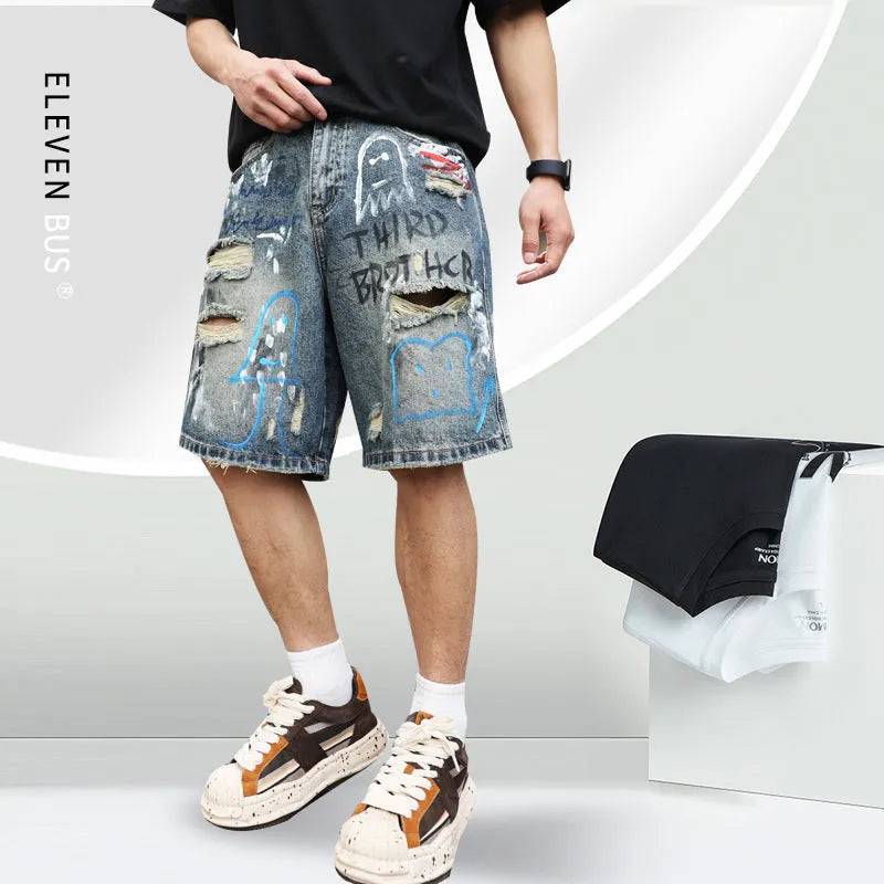 Blue ripped men's denim jeans shorts with graffiti patterns and straight-leg style