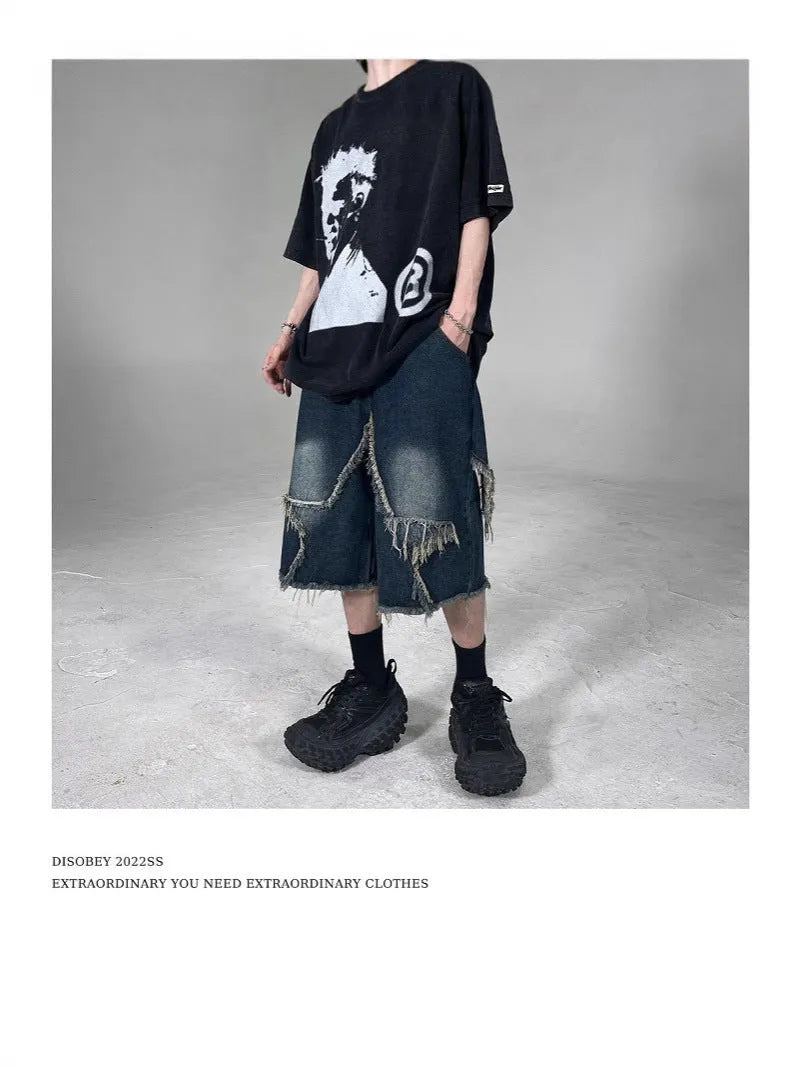 Men's blue denim shorts with frayed edges and five-pointed star design, loose fit for summer