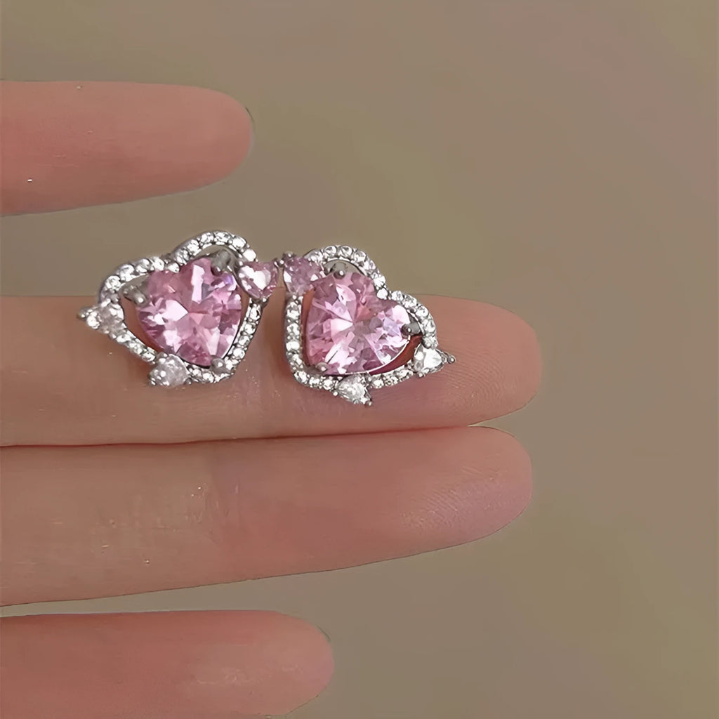 Women's heart stud earrings with white K electroplated finish on copper