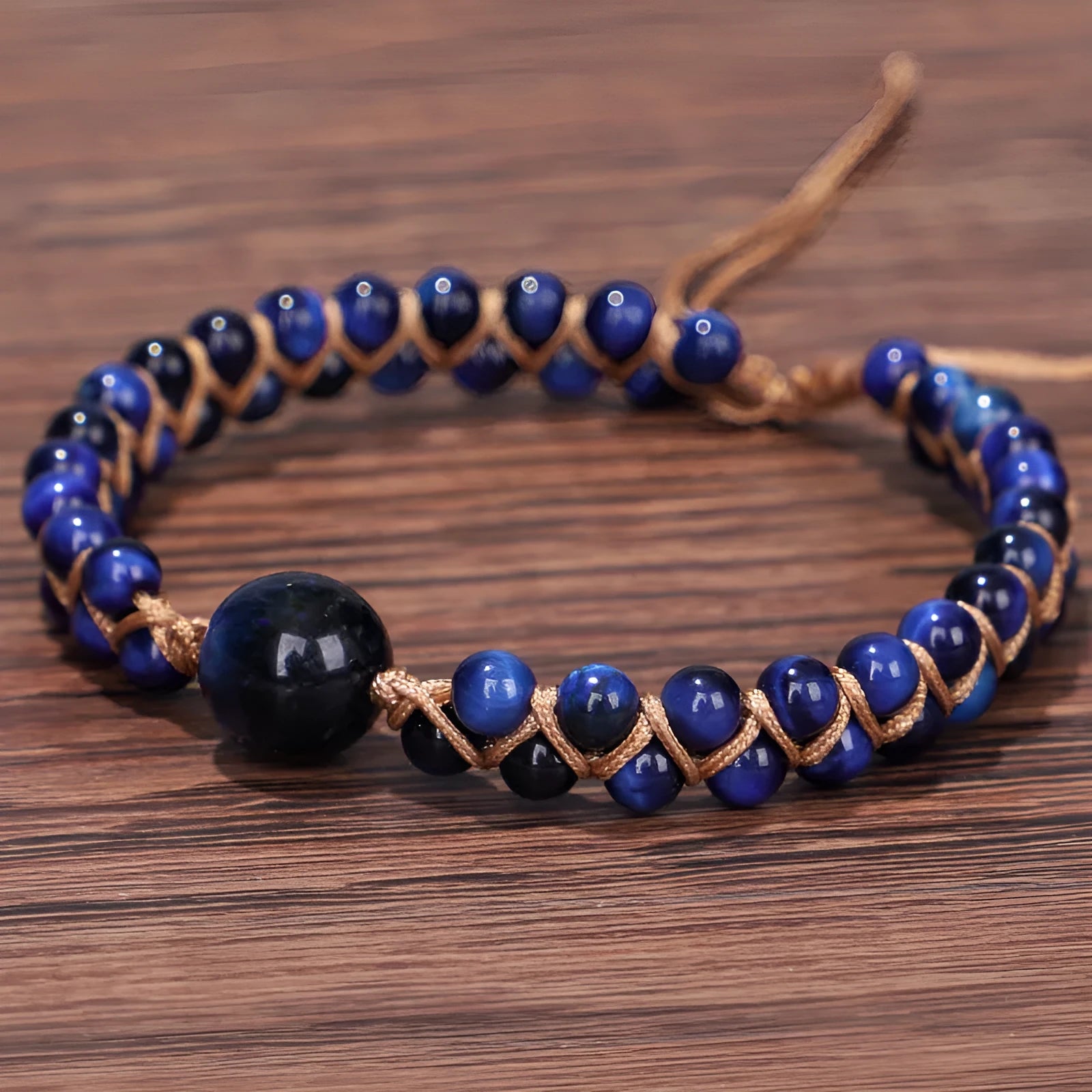 Handmade woven geometric pull bracelet in blue tigereye stone with adjustable cord