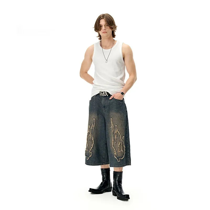 Men's black denim shorts with patch and flame embroidery, cropped length straight leg streetwear