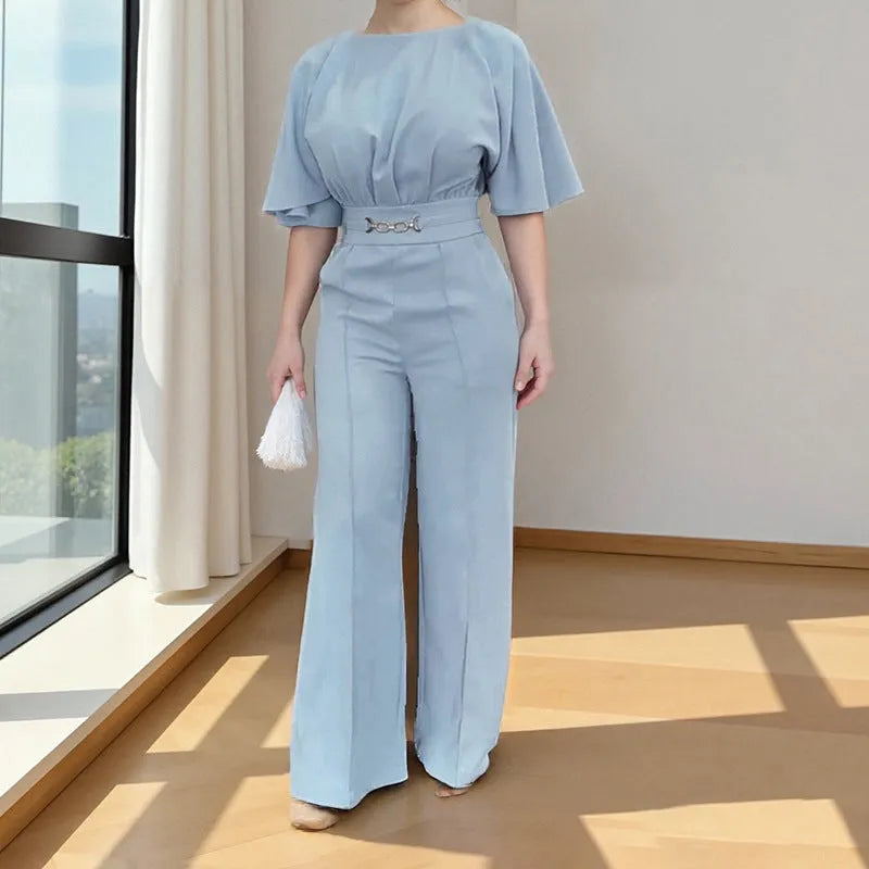 Blue men's two-piece casual suit with long sleeves and trousers on a model