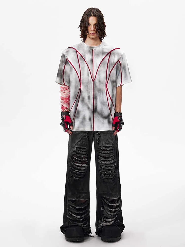 Short sleeve t-shirt with padded shoulders and three-dimensional patchwork design in round neck style