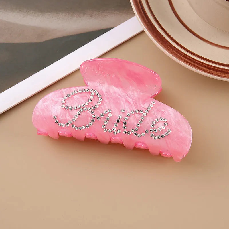 Pink acrylic hair claw clip with diamond pattern and English letters decoration, 10cm size