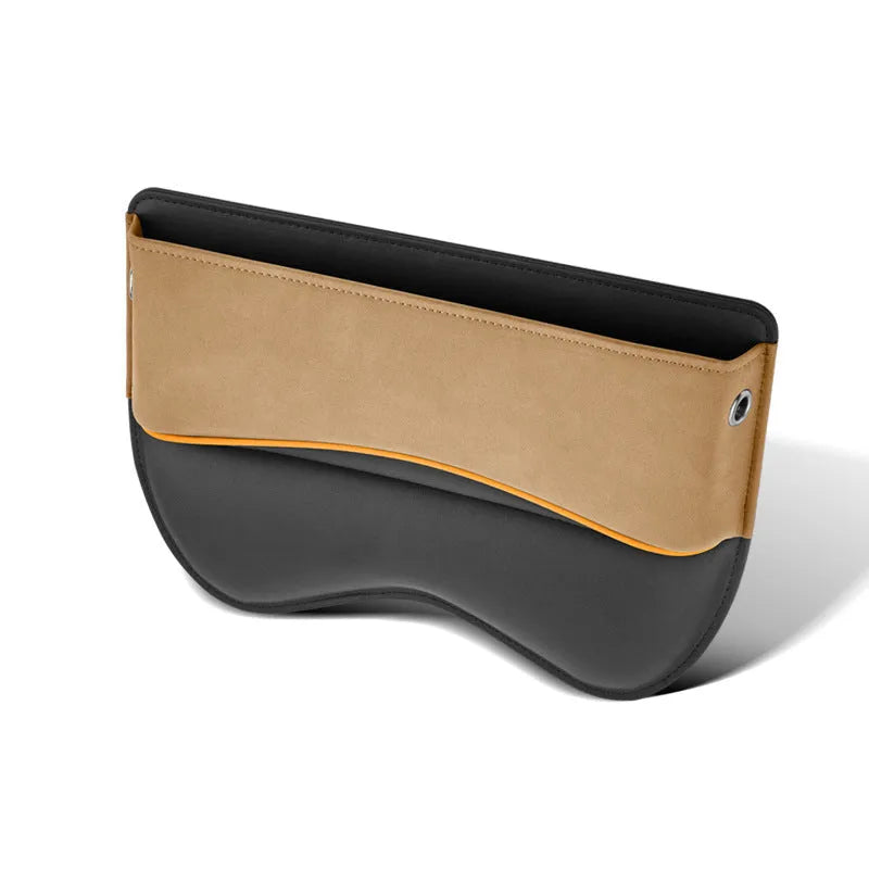 Leather car seat storage box in beige colour on a car seat.