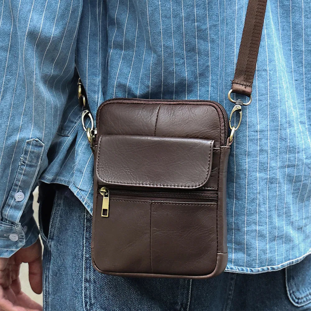 Men's brown leather crossbody shoulder bag with visible sewing lines