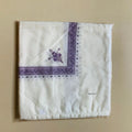 Printed polyester square scarf in brown, gray, green, purple, magenta, or navy blue, measuring 138 x 138 cm.