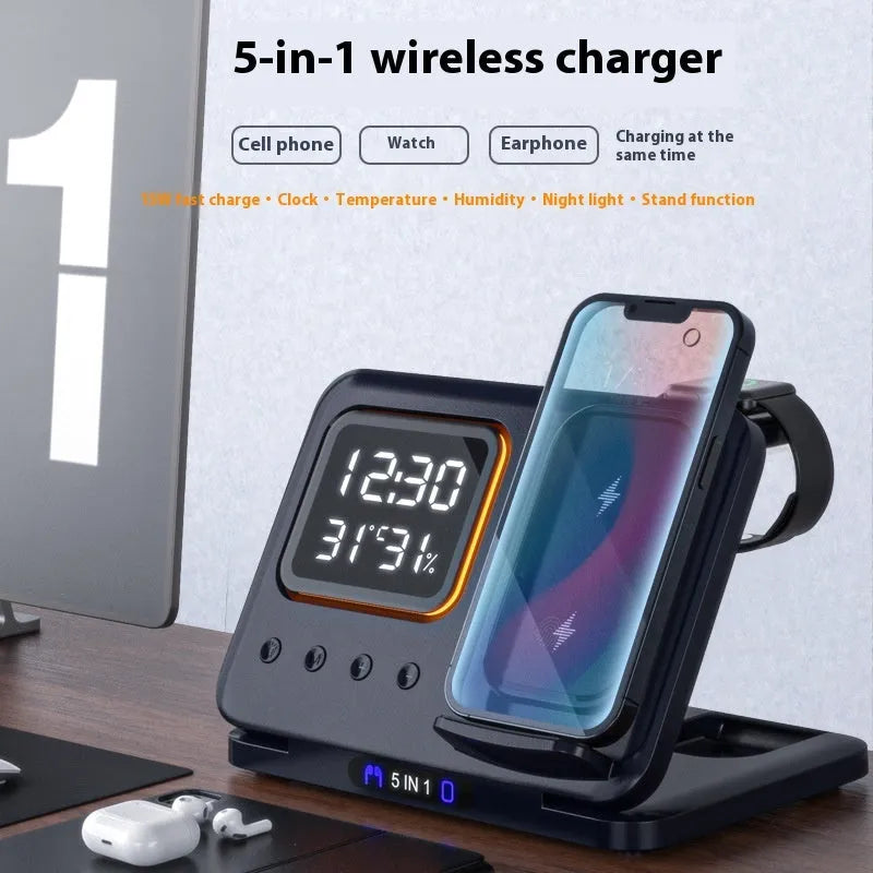 Black 5-in-1 wireless charging station showing phone charging alongside digital clock with temperature display