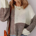 Dark khaki loose sweater with drop shoulders, colour block pattern, and a tie at the back.