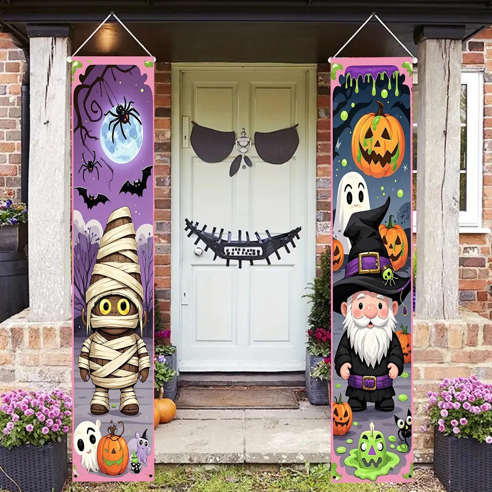 A pair of long, narrow orange and black Halloween-themed polyester hanging banner decorations.