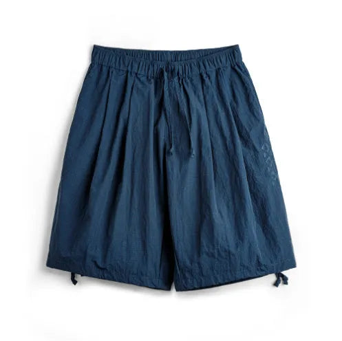 Men's loose fit beach shorts with embroidery in Prussian blue colour
