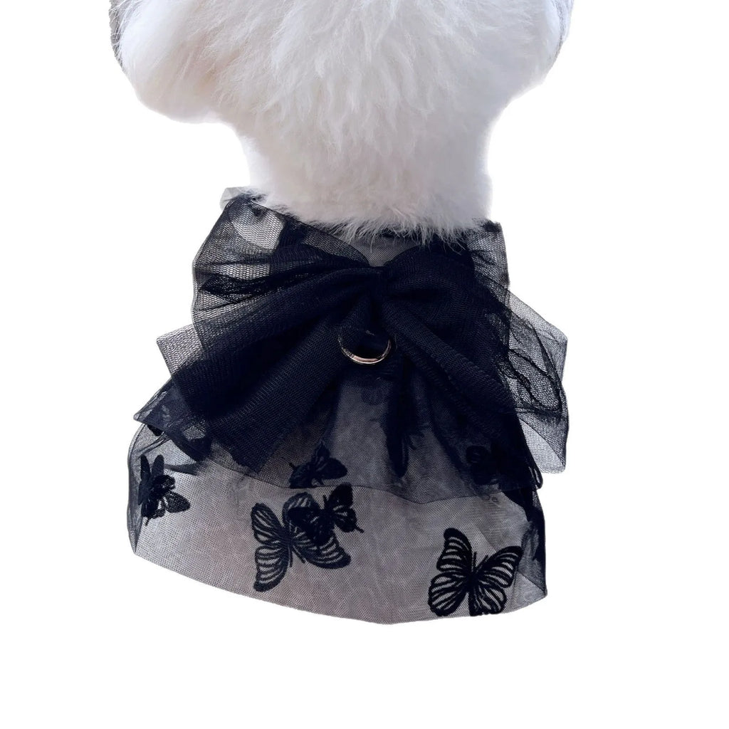 Black tulle princess skirt costume on a small dog, showing the gauze material and fit.