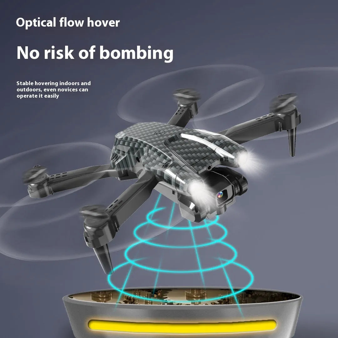 S138 black folding drone with propellers extended, showing its compact size of less than 30cm.