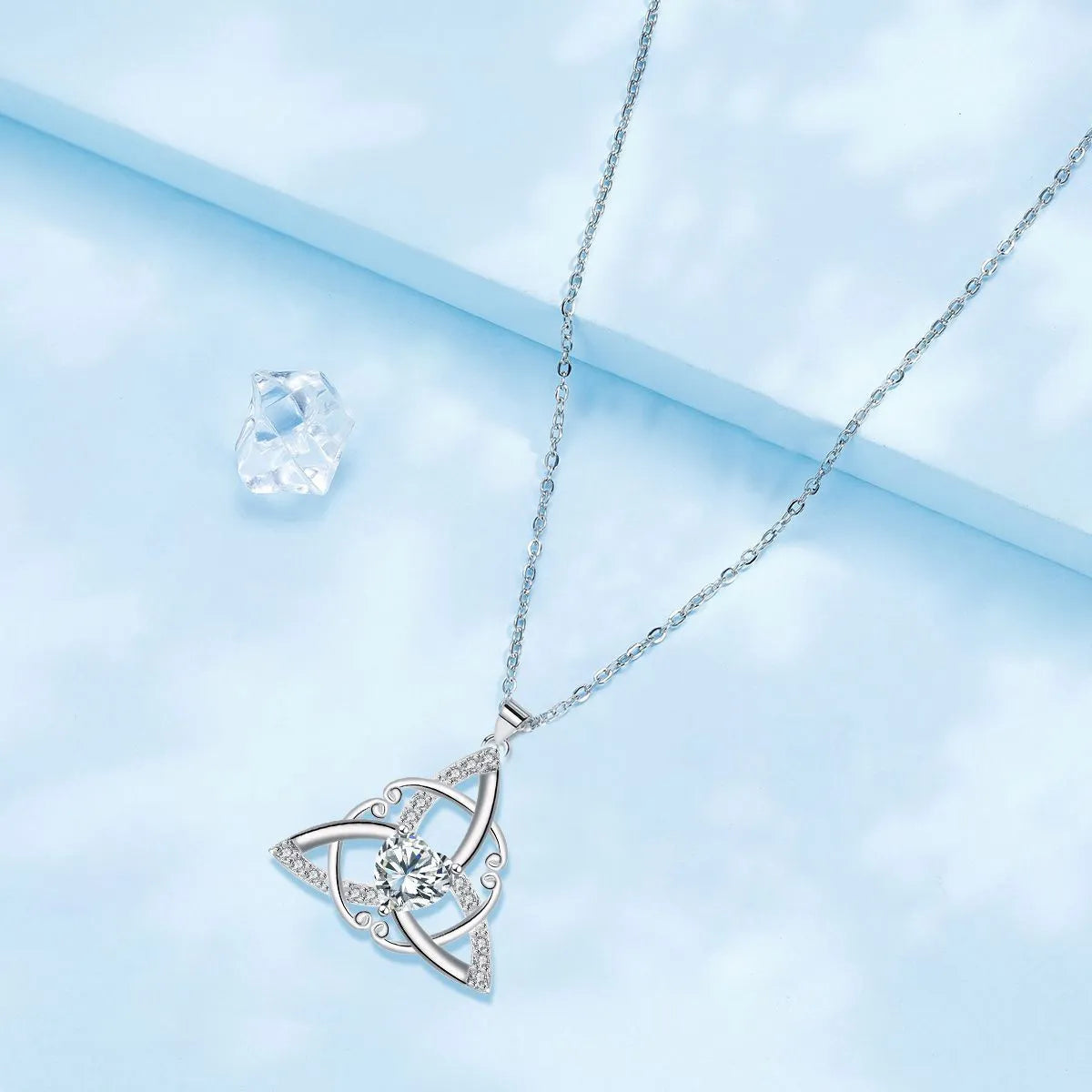 Women's copper Celtic knot necklace with geometric pendant in blue, lvzuan, red diamond, or white diamond finish.