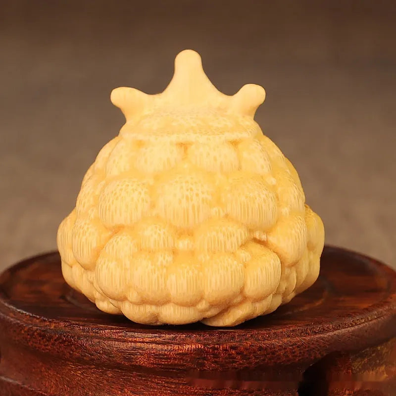 Solid bamboo carving of a cute Crown Princess Toad ornament with detailed live eyes.