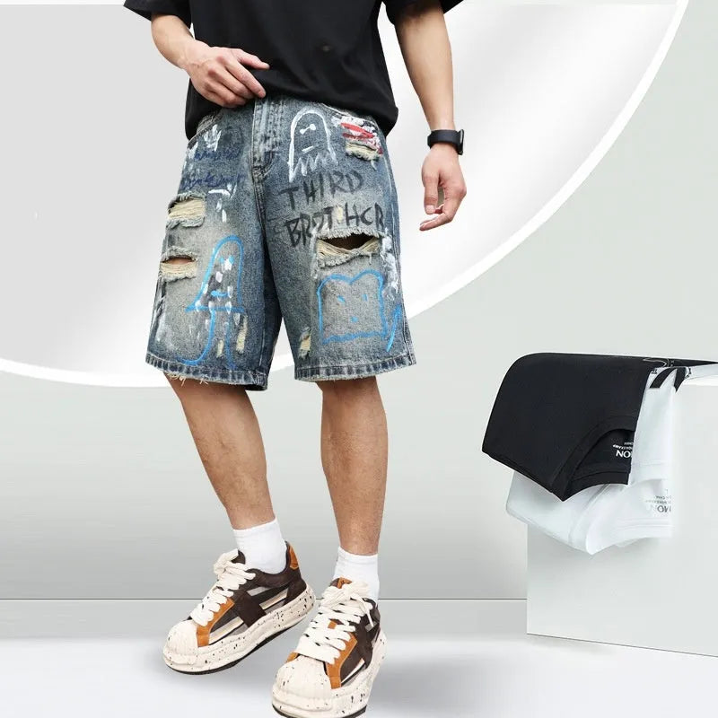 Blue ripped men's denim jeans shorts with graffiti patterns and straight-leg style