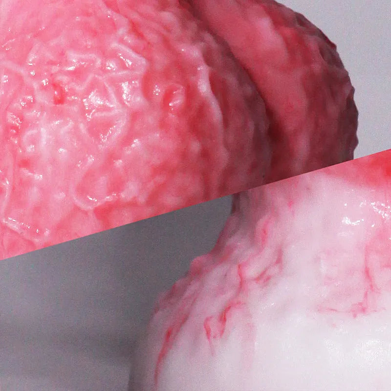 Pink platinum silicone penis-shaped masturbation device for women, showing Berserker S and M models.