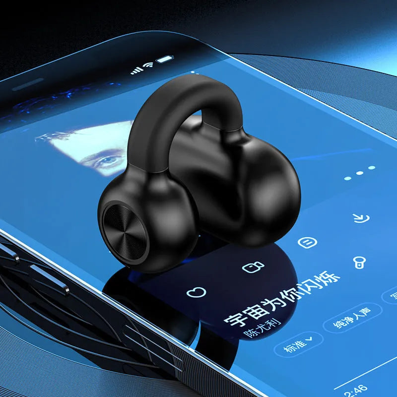 Black wireless bone conduction clip-on bluetooth earphones with charging cable on white background