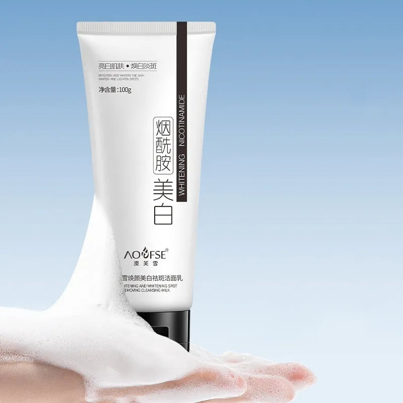 White bottle of whitening and freckle removing facial cleanser, 100ml.