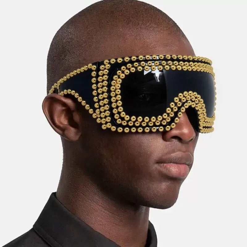 Men's square aviator sunglasses with large rim and rivet details in gold colour.