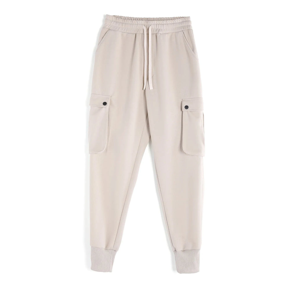 Men's loose cotton sports trousers with ankle-tied cuffs in solid colours