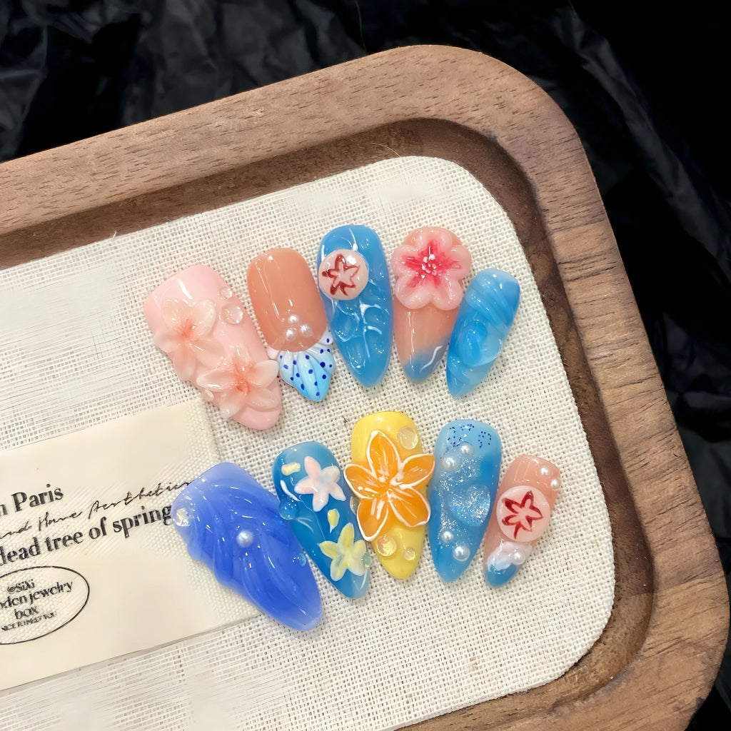 Three-dimensional carved jellyfish design on plastic wearable armour in almond nail colour