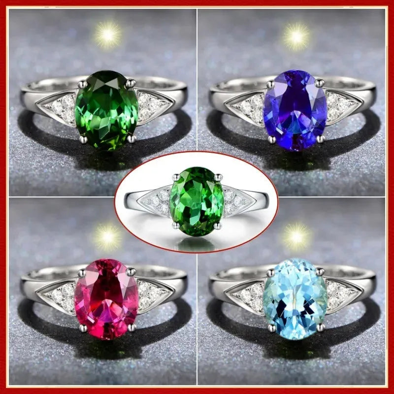 Women's court style ring with inlaid natural zircon stone forming a heart design, on a model's finger.