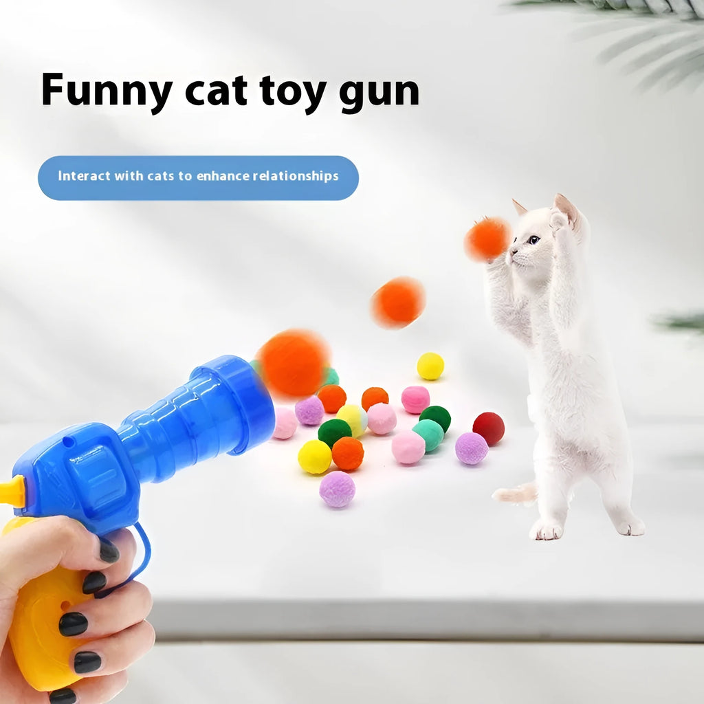 Pet toy ball launcher gun with soft plush yarn balls for interactive play with cats and dogs