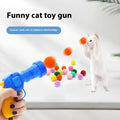 Pet toy ball launcher gun with soft plush yarn balls for interactive play with cats and dogs