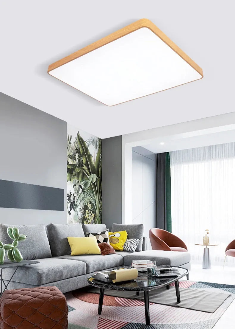 Square modern Nordic LED ceiling light with wood grain finish and iron frame, shown in a bedroom setting.