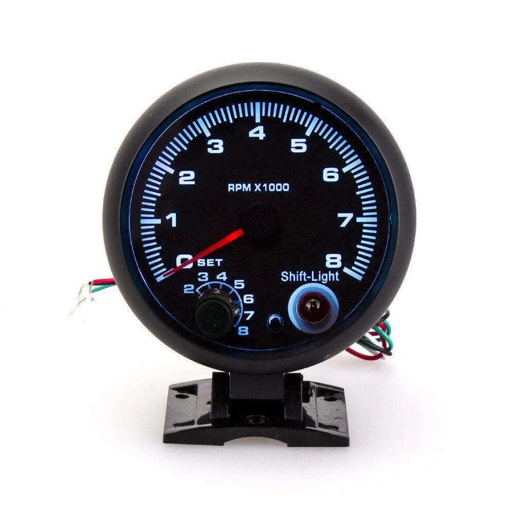 Black automotive tachometer with blue light pointer for 0-8000 RPM engine speed monitoring