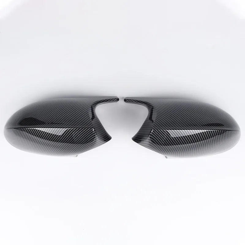 Pair of BMW 3 Series E90 ABS plastic rearview mirror housings in black and carbon pattern finishes