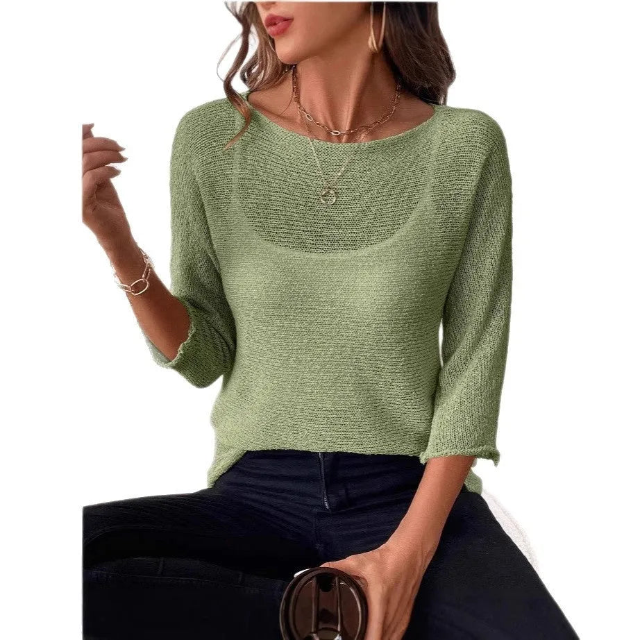 Woman wearing a thin knitted off-shoulder overall with a 3D pattern in a light colour.
