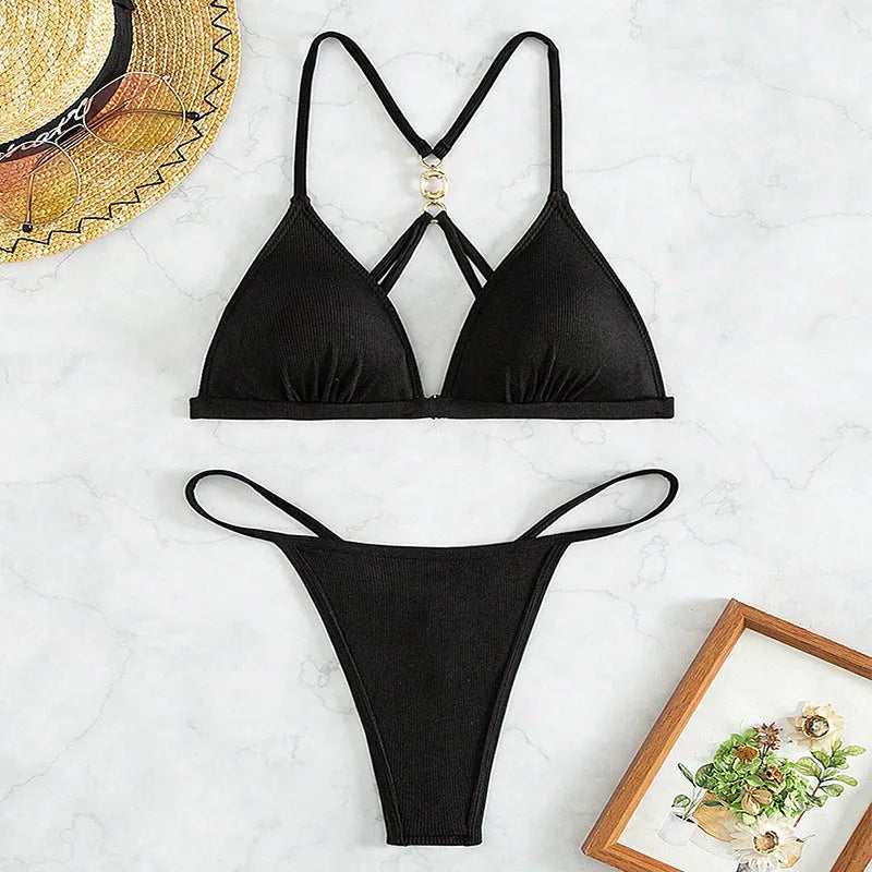 Black women's hollow backless bikini set with triangle top and matching bottoms