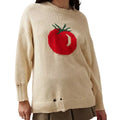 Women's loose-fitting round neck acrylic sweater with jacquard knit texture in a beige colour.