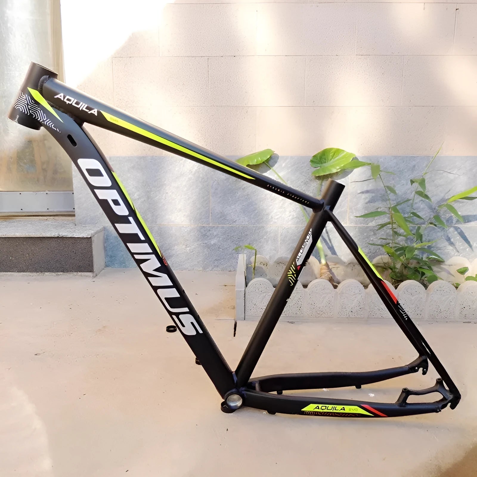 Black Green 29-inch aluminium mountain bike frame with disc brake mounts and inner line routing.
