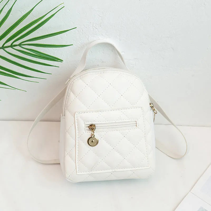 Girls' Korean style embroidered hard backpack in black colour showing sandwich pocket and soft handle