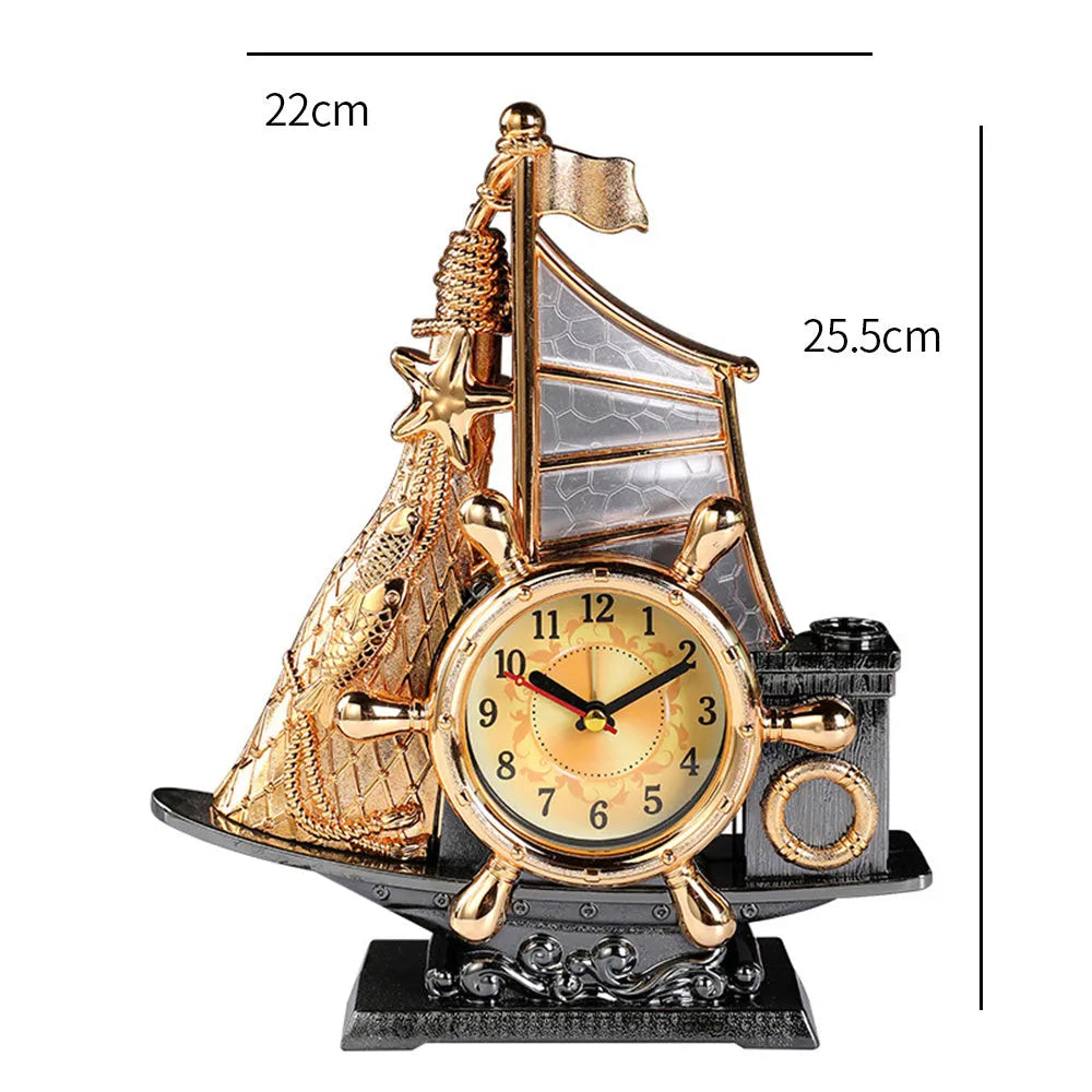 Fashion bedroom clock with gold or silver finish on plastic housing measuring 22.6cm wide