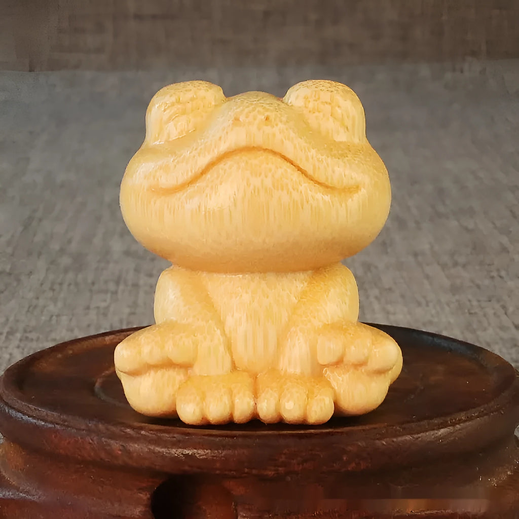Solid bamboo smiling frog carving ornament measuring 5cm height with 4.5cm diameter