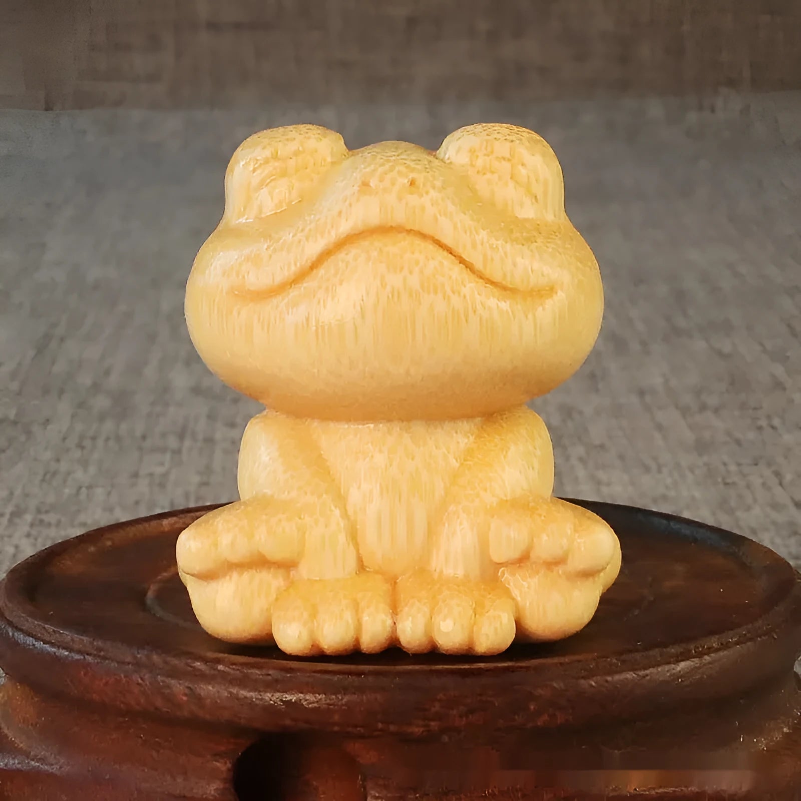 Solid bamboo smiling frog carving ornament measuring 5cm height with 4.5cm diameter